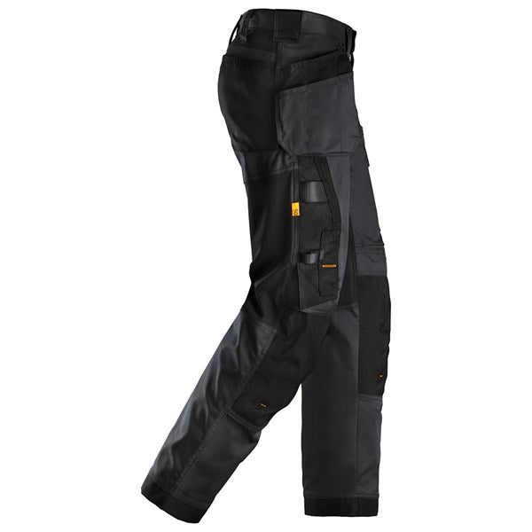"Flexible and durable work trousers with reinforced storage pockets"