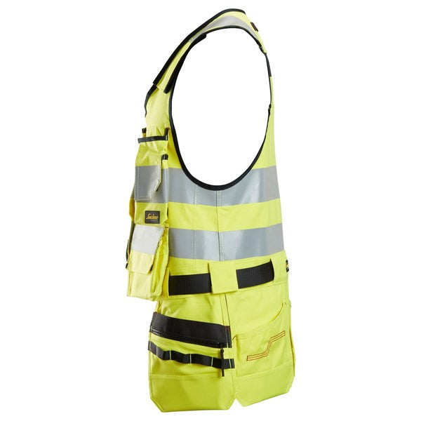 Protective tool vest with flame-retardant fabric and safety features.