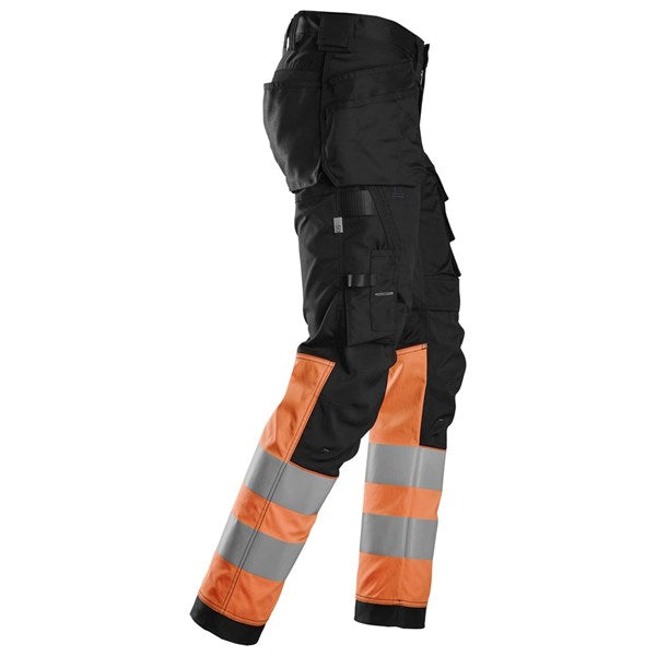 "Ergonomic work trousers with pre-bent legs and functional storage pockets"